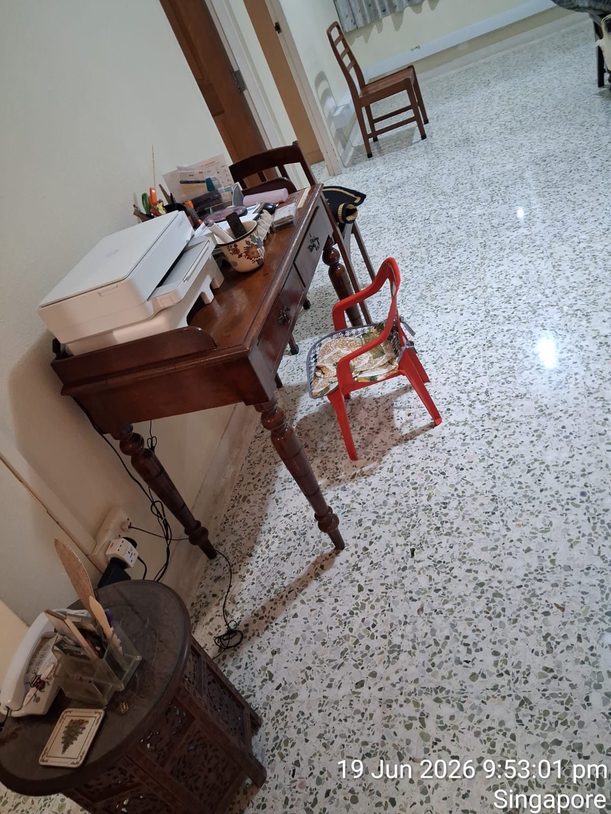 Freshly polished terrazzo study room floor with desk and chair